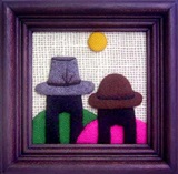 Artisan wall hanging with two cholitas