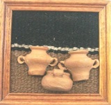 Artisan wall hanging with jars