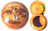 Round jewelbox made in wood with an andean woman